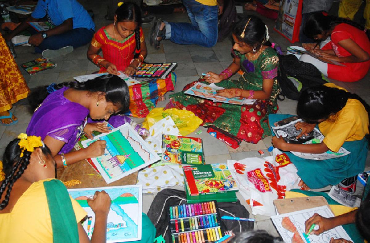 Students participating in a painting competition organised by Swetcha Gora Eye Bank, at Vasavya Mahila Mandali, in Vijayawada, on Friday, as part of the National Eye Donation fortnight